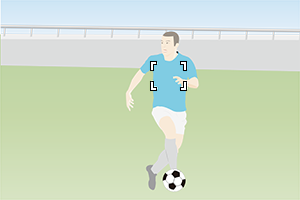 画面右側に移動したサッカー選手にあわせ、ピント位置を右に移動したシーン